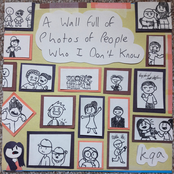 A Wall full of Photos of People Who I Don't Know
