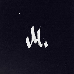 M.