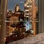 Sleepless streets, a windowside where thoughts linger.