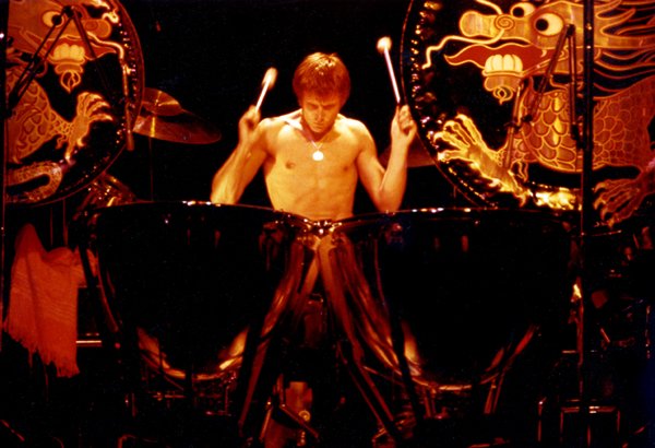 Neil Peart performing behind his drum kit