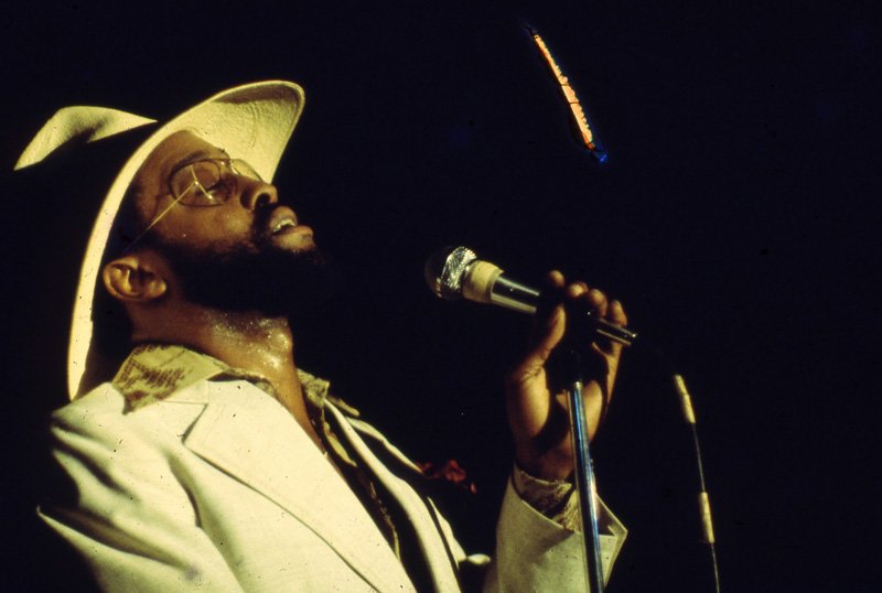 Barry White performing onstage during the height of his success
