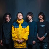 Vertically expanded four-piece group photo
