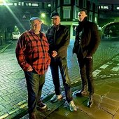 The Hit Parade (L-R Matt Moffat, Julian Henry and Raymond Watts) for the 2024 release of Under The Bridge 2 (Skep Wax)