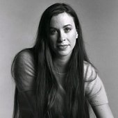 Alanis Morissette photographed by Andrew Faulkner.