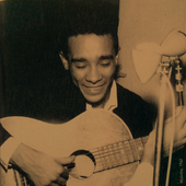 mutinho-young-at-guitar.png