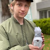 henry holding a thing