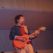 GARICK playing live with band for a high school competition