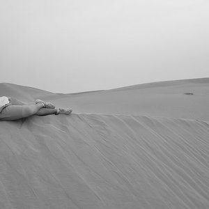 Image for 'desert sand feels warm at night'