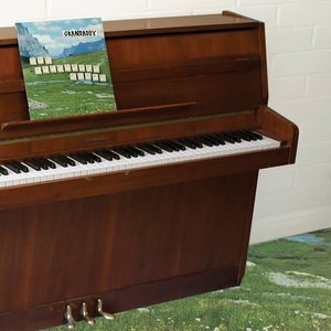 Zdjęcia dla 'The Sophtware Slump ….. on a wooden piano'